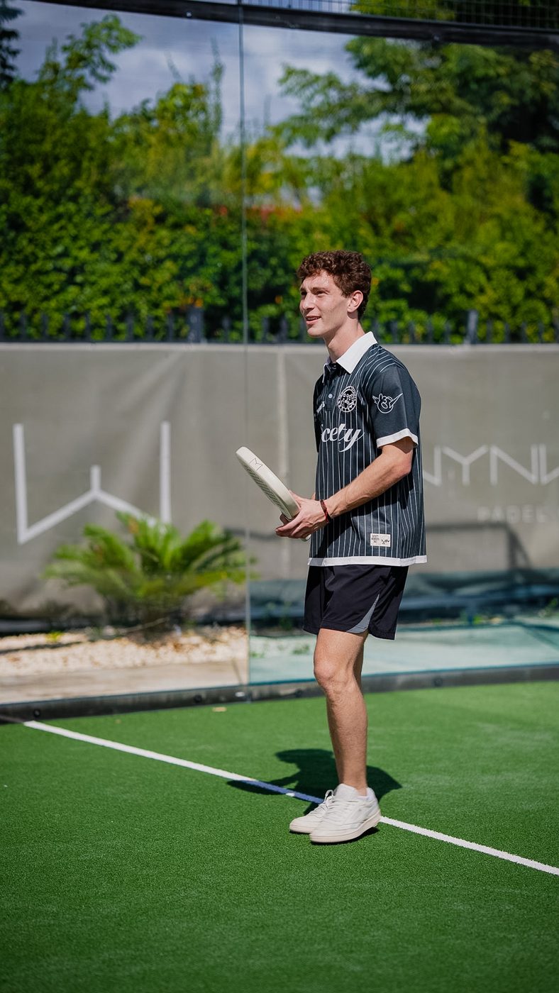 Society Cap worn on the padel court